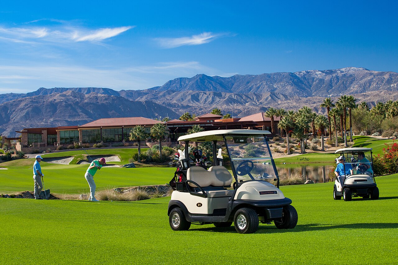 Club Car golf carts parked side by side